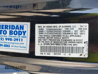 2011 Honda Odyssey Touring with VIN 5FNRL5H97BB073708, listed as a IAAI auction lot 42409164 with 141,986 mi miles and . Bid and sale history available at DreamBid. Image 9.