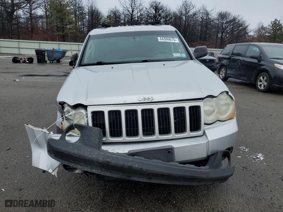 2009 Jeep Grand Cherokee Laredo with VIN 1J8GS48K49C535701, listed as a Copart auction lot 44306675 with 306,585 mi miles and Salvage Title. Bid and sale history available at carsss.com. Image 5.