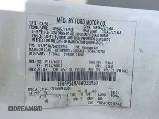 2006 Ford Focus S with VIN 1FAFP34N76W233950, listed as a IAAI auction lot 42596698 with 262,504 mi miles and . Bid and sale history available at DreamBid. Image 9.