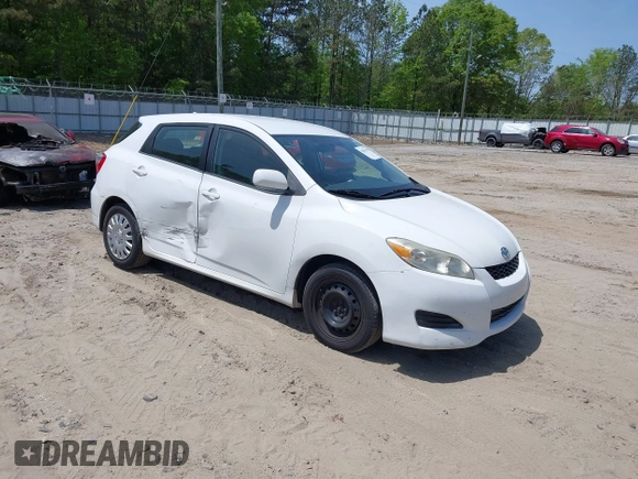 2009 Toyota Matrix with VIN 2T1KU40E39C091087, listed as a IAAI auction lot 42033558 with 338,496 mi miles. Bid and sale history available at carsss.com. Image 1.