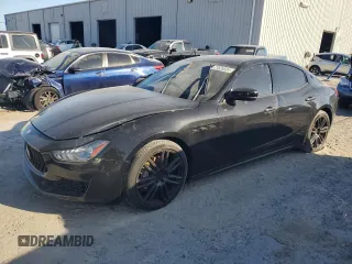 2019 Maserati Ghibli z VIN ZAM57XSA9K1308602, wystawiony jako Copart lot #77626594 z przebiegiem 18 185 mil mil oraz Szkody całkowita. Historia ofert i sprzedaży dostępna na DreamBid. Obrazek 1.