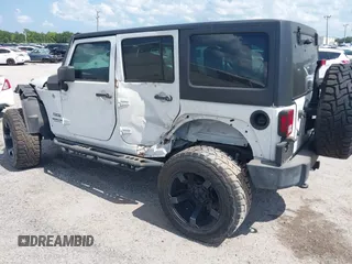 2016 Jeep Wrangler Unlimited Sport with VIN 1C4BJWDGXGL335825, listed as a IAAI auction lot 28960589 with 28,515 mi miles and . Bid and sale history available at DreamBid. Image 3.