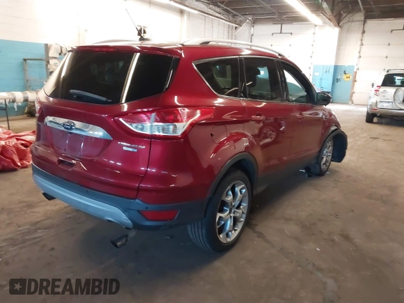2014 Ford Escape Titanium with VIN 1FMCU9JX5EUC14849, listed as a IAAI auction lot 42037132 with 141,591 mi miles. Bid and sale history available at carsss.com. Image 4.