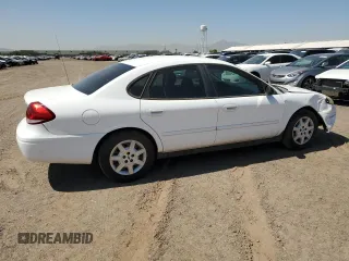 2006 Ford Taurus SE with VIN 1FAFP53UX6A194398, listed as a Copart auction lot 59582515 with 114,933 mi miles and Salvage title. Bid and sale history available at DreamBid. Image 3.