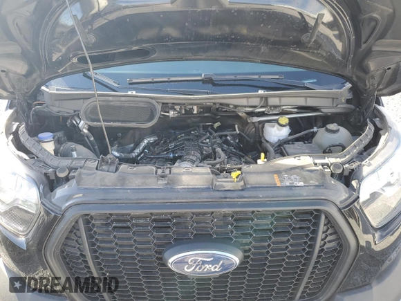 2023 Ford Transit Passenger XL with VIN 1FBVU4XG3PKA55923, listed as a Copart auction lot 47928165 with 83,174 mi miles and Salvage title. Bid and sale history available at DreamBid. Image 12.