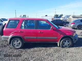 2000 Honda CR-V EX with VIN JHLRD1863YC051709, listed as a IAAI auction lot 41678500 with 197,313 mi miles. Bid and sale history available at carsss.com. Image 13.