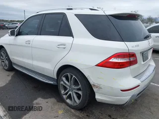 2014 Mercedes-Benz M 350 with VIN 4JGDA5JB2EA282733, listed as a IAAI auction lot 42070426 with 148,513 mi miles and . Bid and sale history available at DreamBid. Image 3.