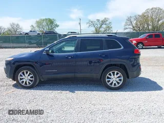 2015 Jeep Cherokee Limited z VIN 1C4PJMDS0FW551615, wystawiony jako IAAI lot #42080944 z przebiegiem 175 793 mil mil oraz . Historia ofert i sprzedaży dostępna na DreamBid. Obrazek 14.