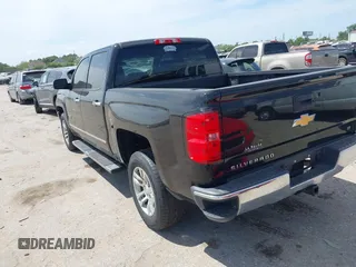 2018 Chevrolet Silverado 1500 LT with VIN 3GCPCREC1JG603937, listed as a IAAI auction lot 42067510 with 81,187 mi miles and . Bid and sale history available at DreamBid. Image 3.