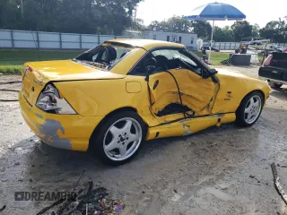 1999 Mercedes-Benz SLK-Class with VIN WDBKK47F9XF076441, listed as a Copart auction lot 73745154 with 104,481 mi miles and Salvage Title. Bid and sale history available at carsss.com. Image 3.