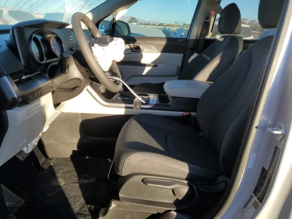 2023 Kia Carnival LX with VIN KNDNB4H38P6259011, listed as a Copart auction lot 83115784 with 16,571 mi miles and Salvage Title. Bid and sale history available at carsss.com. Image 7.