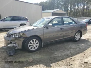 2003 Toyota Camry LE with VIN 4T1BE30K43U724778, listed as a Copart auction lot 53515605 with 176,568 mi miles and Salvage Title. Bid and sale history available at DreamBid. Image 1.