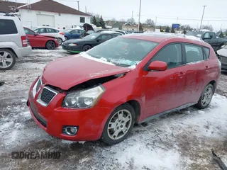 2009 Pontiac Vibe with VIN 5Y2SM67059Z411893, listed as a IAAI auction lot 41446097 with 94,159 mi miles. Bid and sale history available at carsss.com. Image 6.