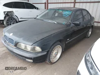 1998 BMW 5 Series 528i z VIN WBADD6325WBW34033, wystawiony jako IAAI lot #41025167 z przebiegiem Nie podano mil oraz . Historia ofert i sprzedaży dostępna na DreamBid. Obrazek 2.