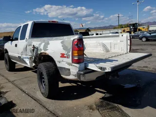 1999 GMC New Sierra 1500 SLE with VIN 2GTEK19T8X1550662, listed as a Copart auction lot 75829934 with 341,510 mi miles and Salvage Title. Bid and sale history available at carsss.com. Image 2.