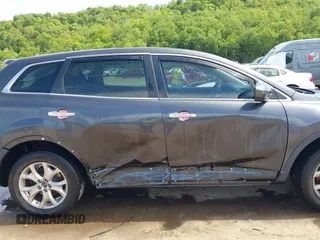 2014 Mazda CX-9 Touring with VIN JM3TB3CV9E0426767, listed as a IAAI auction lot 42301021 with 129,497 mi miles and . Bid and sale history available at DreamBid. Image 14.