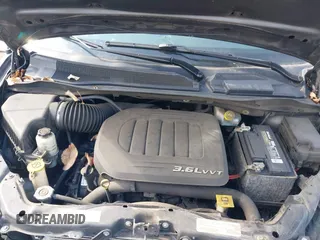 2019 Dodge Grand Caravan SXT with VIN 2C4RDGCG1KR514123, listed as a IAAI auction lot 41777811 with 119,087 mi miles and . Bid and sale history available at DreamBid. Image 10.