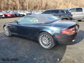 2009 Aston Martin DB9 with VIN SCFAD02E79GB10991, listed as a Copart auction lot 85487894 with 0 mi miles and Salvage Title. Bid and sale history available at carsss.com. Image 2.