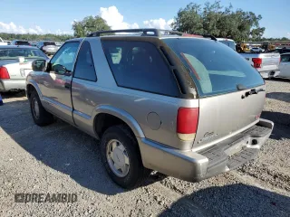 2000 GMC Jimmy SLS Base with VIN 1GKCS18W0YK167906, listed as a Copart auction lot 73840484 with 141,230 mi miles and Salvage Title. Bid and sale history available at carsss.com. Image 2.