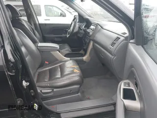 2007 Honda Pilot EX-L with VIN 2HKYF18557H500711, listed as a IAAI auction lot 41794731 with 168,553 mi miles. Bid and sale history available at carsss.com. Image 5.