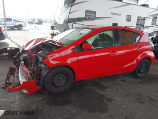 2015 Toyota Prius c One with VIN JTDKDTB34F1100627, listed as a IAAI auction lot 41479976 with 92,622 mi miles. Bid and sale history available at carsss.com. Image 18.