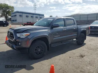 2019 Toyota Tacoma SR with VIN 3TMCZ5AN5KM216212, listed as a Copart auction lot 61574915 with 18,873 mi miles and Salvage title. Bid and sale history available at DreamBid. Image 1.