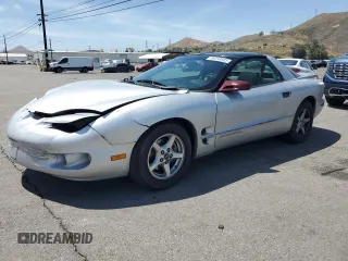 2000 Pontiac Firebird Firebird z VIN 2G2FS22K5Y2116047, wystawiony jako Copart lot #58234695 z przebiegiem 155 876 mil mil oraz Tytuł czysty. Historia ofert i sprzedaży dostępna na DreamBid. Obrazek 1.