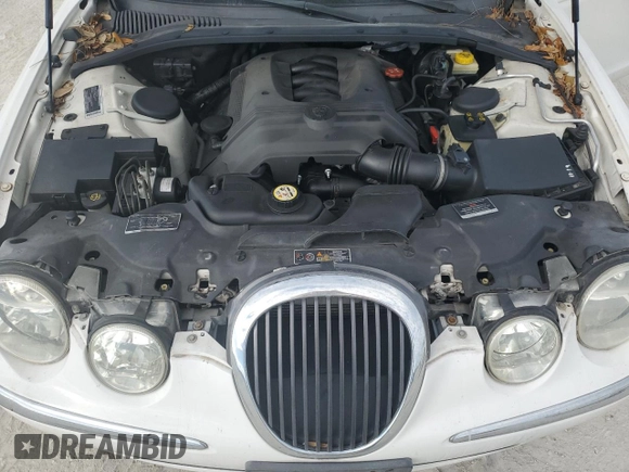 2003 Jaguar S-Type z VIN SAJEA01UX3HM59287, wystawiony jako Copart lot #85619554 z przebiegiem 182 851 mil mil oraz Tytuł czysty. Historia ofert i sprzedaży dostępna na DreamBid. Obrazek 11.