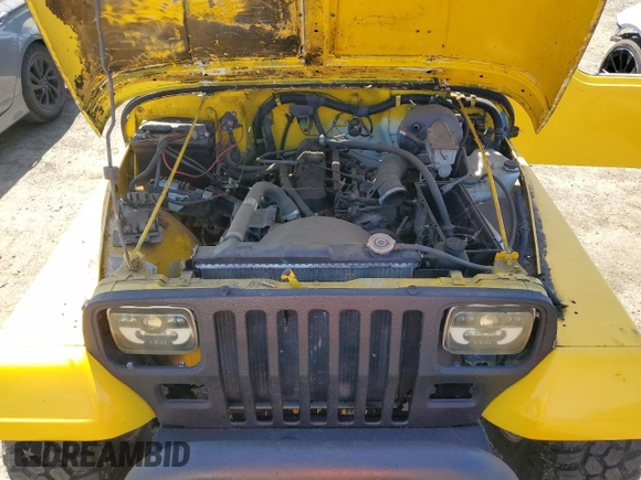 1992 Jeep Wrangler z VIN 2J4FY19P1NJ533862, wystawiony jako Copart lot #69116634 z przebiegiem 105 340 mil mil oraz Czysty tytuł • Clean title. Historia ofert i sprzedaży dostępna na DreamBid. Obrazek 11.