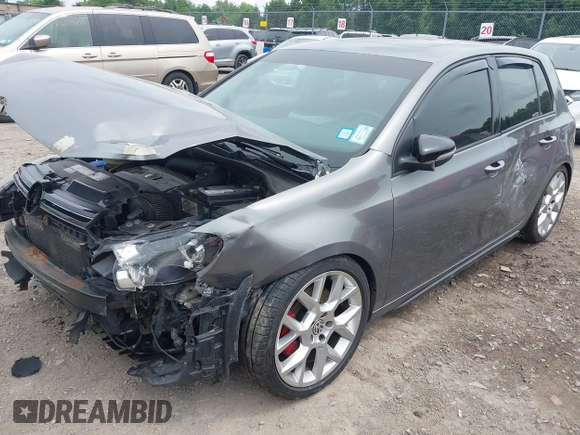2012 Volkswagen Golf GTI w/Sunroof & Navi PZEV with VIN WVWHD7AJ3CW041442, listed as a IAAI auction lot 42701496 with 138,495 mi miles and . Bid and sale history available at DreamBid. Image 2.