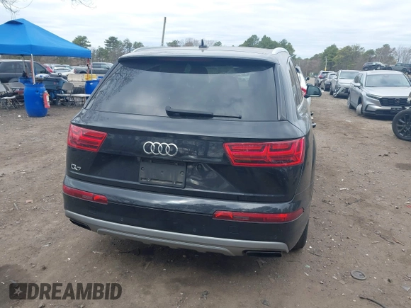 2019 Audi Q7 Premium with VIN WA1AAAF74KD002299, listed as a IAAI auction lot 42066717 with 91,898 mi miles and . Bid and sale history available at DreamBid. Image 16.