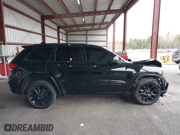 2019 Jeep Grand Cherokee Laredo E with VIN 1C4RJFAG0KC565739, listed as a IAAI auction lot 42039038 with 103,358 mi miles and . Bid and sale history available at DreamBid. Image 13.