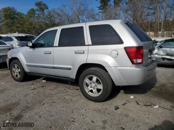 2007 Jeep Grand Cherokee Laredo with VIN 1J8HS48P57C697382, listed as a Copart auction lot 87682865 with 154,732 mi miles and Salvage Title. Bid and sale history available at carsss.com. Image 2.