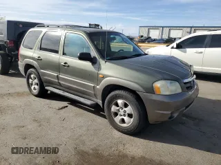 2002 Mazda Tribute LX with VIN 4F2YU09102KM66117, listed as a Copart auction lot 50425755 with 200,902 mi miles and Salvage Title. Bid and sale history available at carsss.com. Image 4.