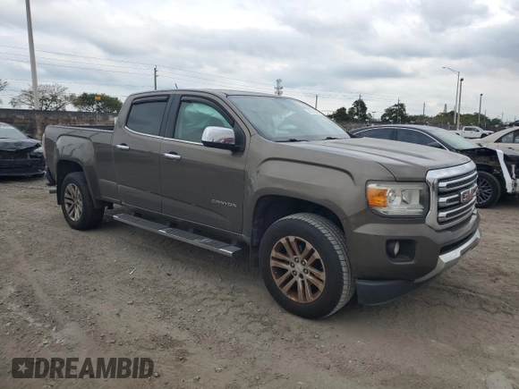 2015 GMC Canyon 2WD SLT with VIN 1GTG5CE31F1118775, listed as a Copart auction lot 45272905 with 119,639 mi miles and Salvage Title. Bid and sale history available at carsss.com. Image 4.