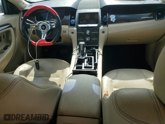 2015 Ford Taurus Limited с VIN 1FAHP2F8XFG154941, выставлен на аукционе Copart как лот 62175545 с пробегом 80 976 миль миль и Чистый • Clean title. История ставок и продаж доступна на DreamBid. Изображение 8.