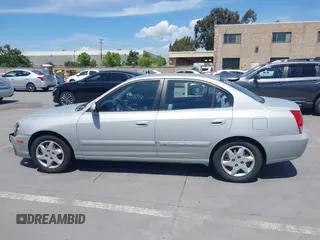 2004 Hyundai Elantra GLS z VIN KMHDN46D74U781436, wystawiony jako IAAI lot #42260519 z przebiegiem 132 943 mil mil oraz . Historia ofert i sprzedaży dostępna na DreamBid. Obrazek 14.