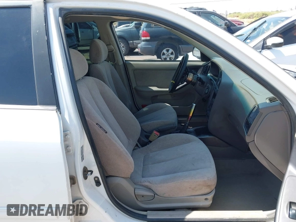 2004 Hyundai Elantra GLS z VIN KMHDN46D64U808402, wystawiony jako IAAI lot #42341726 z przebiegiem Nie podano mil oraz . Historia ofert i sprzedaży dostępna na DreamBid. Obrazek 5.