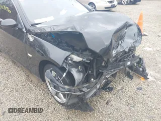 2007 BMW 3 Series 328xi with VIN WBAWC33597PD07288, listed as a IAAI auction lot 41528340 with 182,013 mi miles and . Bid and sale history available at DreamBid. Image 18.