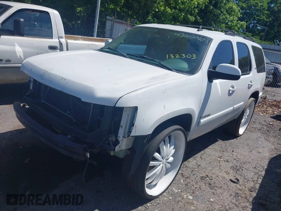 2007 Chevrolet Tahoe LT z VIN 1GNFC13J87J132303, wystawiony jako IAAI lot #42162969 z przebiegiem Nie podano mil oraz . Historia ofert i sprzedaży dostępna na DreamBid. Obrazek 2.
