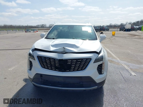 2020 Cadillac XT4 AWD Premium Luxury z VIN 1GYFZDR44LF036461, wystawiony jako IAAI lot #41934371 z przebiegiem 90 545 mil mil oraz . Historia ofert i sprzedaży dostępna na DreamBid. Obrazek 12.