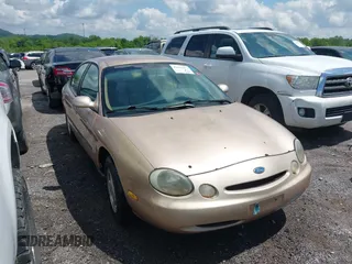 1997 Ford Taurus GL z VIN 1FALP52U9VA280563, wystawiony jako IAAI lot #42045413 z przebiegiem 219 484 mil mil oraz . Historia ofert i sprzedaży dostępna na DreamBid. Obrazek 14.