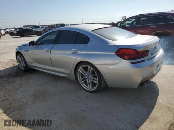 2013 BMW 6 Series 650i xDrive with VIN WBA6B4C59DD098525, listed as a Copart auction lot 67160694 with 52,413 mi miles and Salvage Title. Bid and sale history available at carsss.com. Image 2.