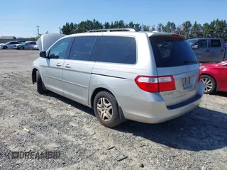 2007 Honda Odyssey EX-L with VIN 5FNRL387X7B080906, listed as a IAAI auction lot 41910061 with 229,717 mi miles and . Bid and sale history available at DreamBid. Image 3.
