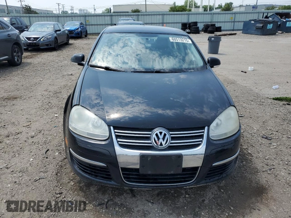 2009 Volkswagen Jetta S with VIN 3VWJM71K69M154382, listed as a Copart auction lot 60513215 with 193,278 mi miles and Salvage title. Bid and sale history available at DreamBid. Image 5.