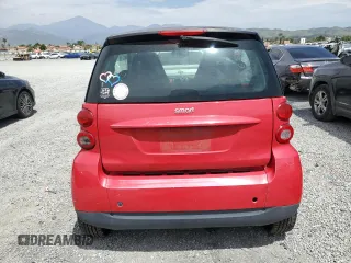 2009 Smart fortwo Pure z VIN WMEEJ31X89K291074, wystawiony jako Copart lot #56897635 z przebiegiem 145 504 mil mil oraz Tytuł czysty. Historia ofert i sprzedaży dostępna na DreamBid. Obrazek 6.