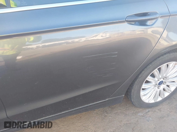 2016 Ford Fusion SE Hybrid с VIN 3FA6P0LU9GR285513, выставлен на аукционе IAAI как лот 42796945 с пробегом 150 697 миль миль и . История ставок и продаж доступна на DreamBid. Изображение 6.