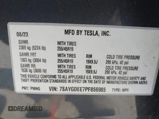 2023 Tesla Model Y Long Range with VIN 7SAYGDEE7PF856985, listed as a IAAI auction lot 42097675 with 13,112 mi miles and . Bid and sale history available at DreamBid. Image 9.