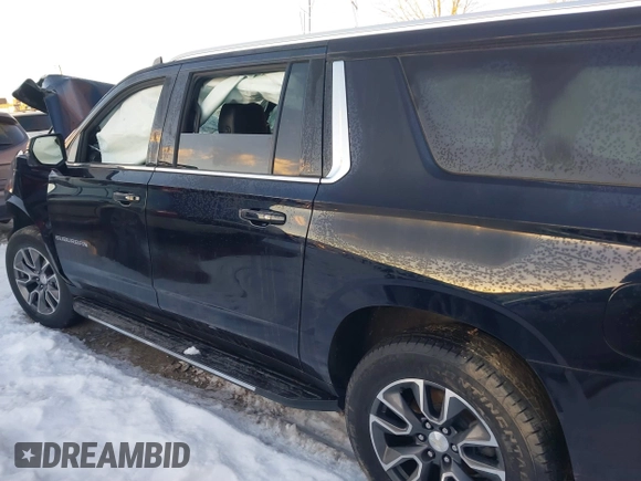 2022 Chevrolet Suburban LT with VIN 1GNSKCKD9NR108079, listed as a IAAI auction lot 41305503 with 76,580 mi miles and . Bid and sale history available at DreamBid. Image 15.
