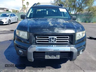 2007 Honda Ridgeline RTL w/Leather with VIN 2HJYK16577H547869, listed as a IAAI auction lot 41939741 with 248,916 mi miles. Bid and sale history available at carsss.com. Image 6.